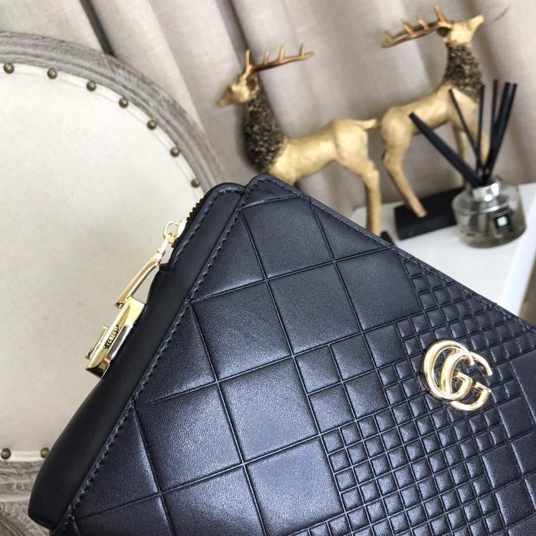 Ví nam cầm tay Gucci siêu cấp đen họa tiết logo