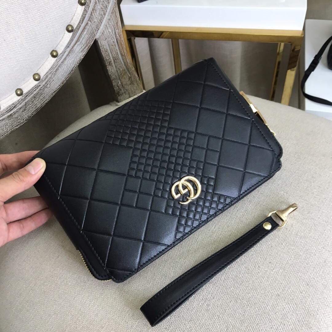Ví nam cầm tay Gucci siêu cấp đen họa tiết logo