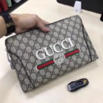 Ví nam cầm tay Gucci siêu cấp caro họa tiết logo