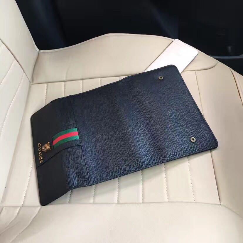 Ví nam cầm tay Gucci siêu cấp họa tiết con báo
