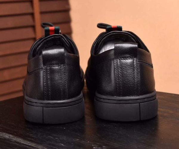 Giày nam Versace siêu cấp đen họa tiết mặt người