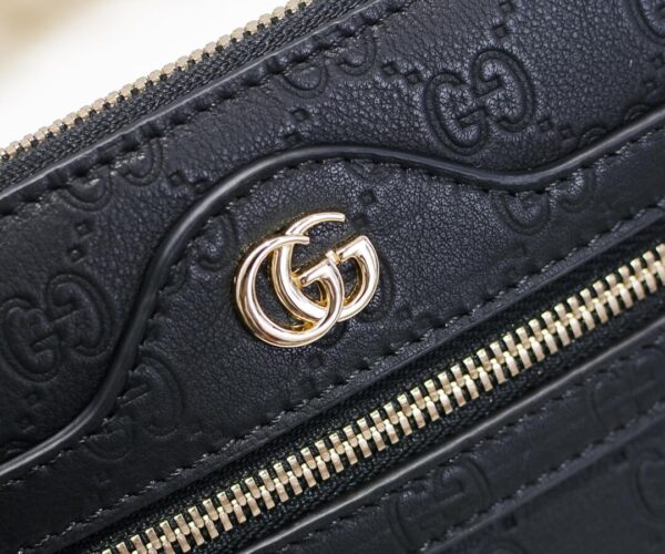 Clutch nam Gucci màu đen hoạ tiết logo CG vàng siêu cấp