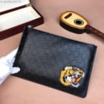 Ví nam Gucci siêu cấp cầm tay da đen trơn họa tiết hổ