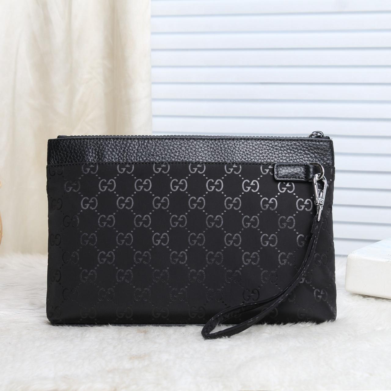 Ví nam Gucci siêu cấp cầm tay đen trơn họa tiết logo