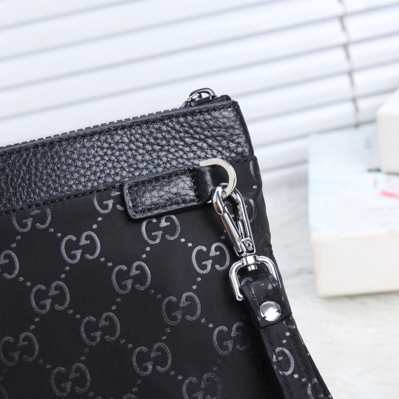 Ví nam Gucci siêu cấp cầm tay đen trơn họa tiết logo