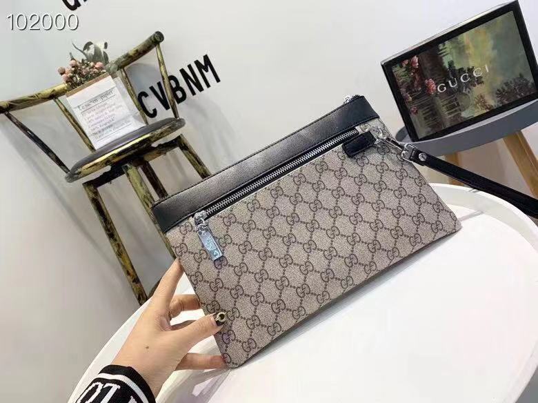 Ví nam Gucci siêu cấp cầm tay họa tiết logo nâu viền đen 