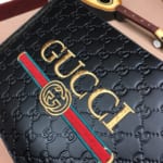 Ví nam Gucci siêu cấp cầm tay họa tiết logo ở giữa