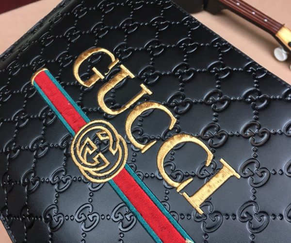 Ví nam Gucci siêu cấp cầm tay họa tiết logo ở giữa