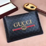 Ví nam Gucci siêu cấp cầm tay họa tiết logo ở giữa