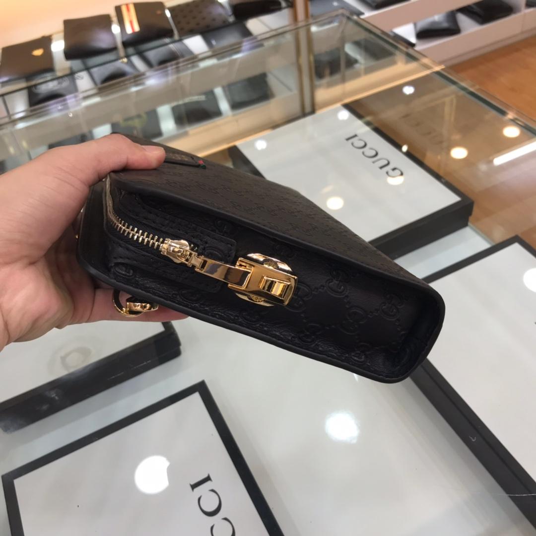 Ví nam Gucci siêu cấp cầm tay khóa số họa tiết logo đen