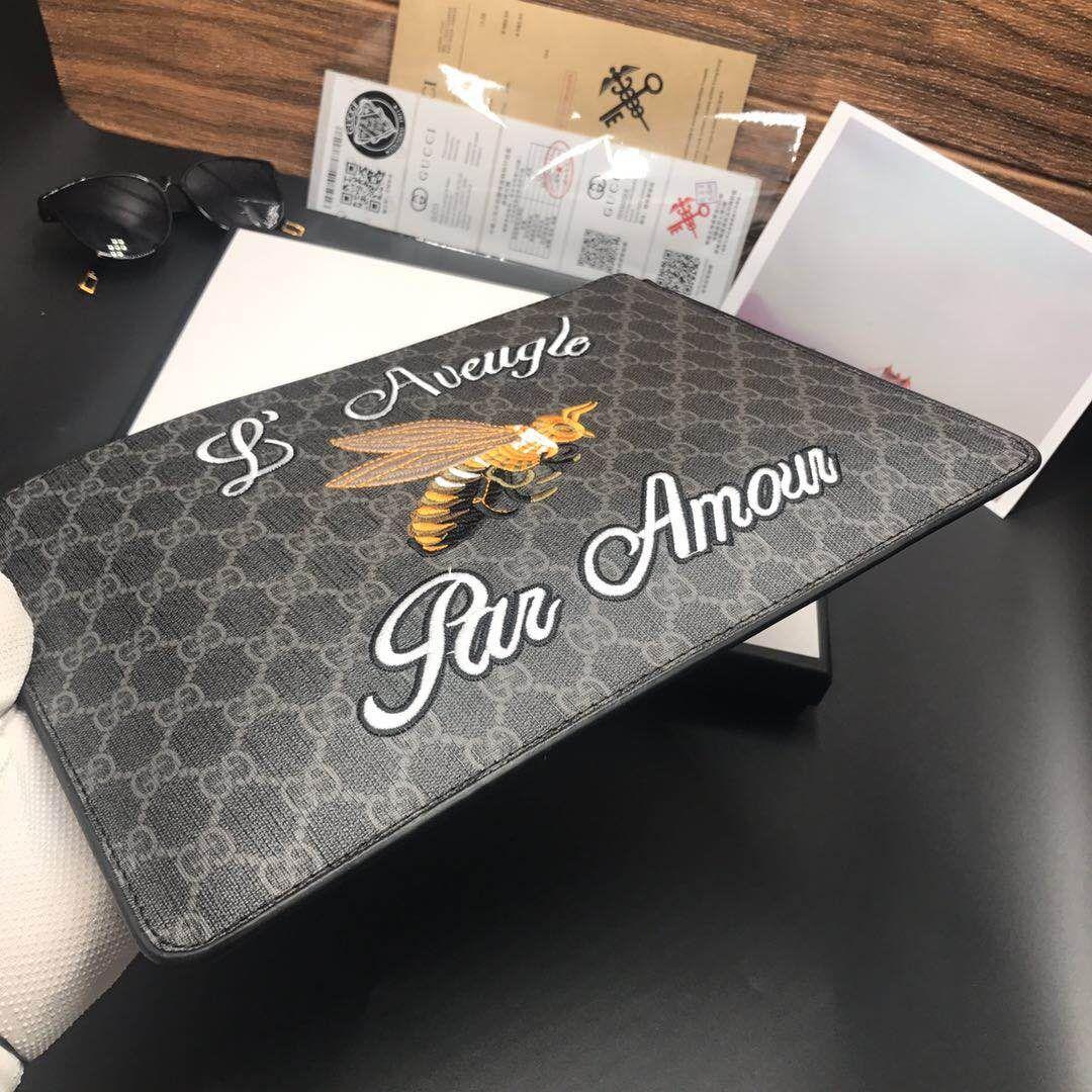 Ví nam Gucci siêu cấp cầm tay vàng họa tiết ong 