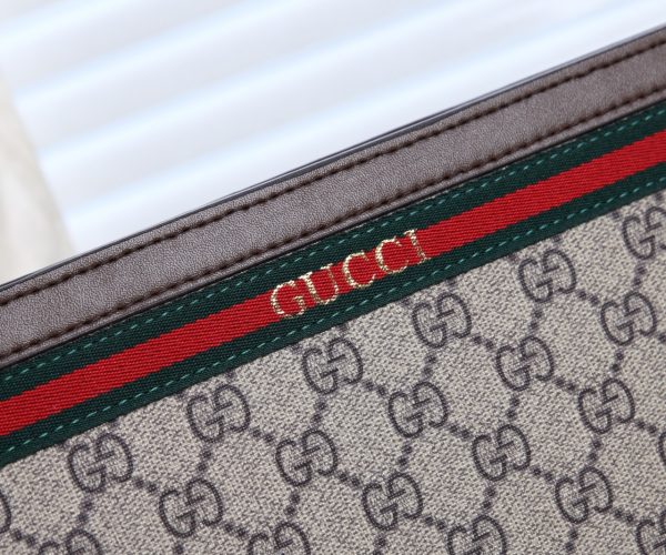 Ví nam Gucci siêu cấp cầm tay viền kẻ đỏ họa tiết logo