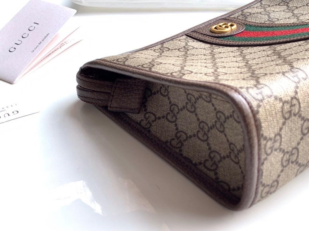 Ví nam Gucci siêu cấp cầm tay họa tiêt logo màu be viền kẻ đỏ VNG94