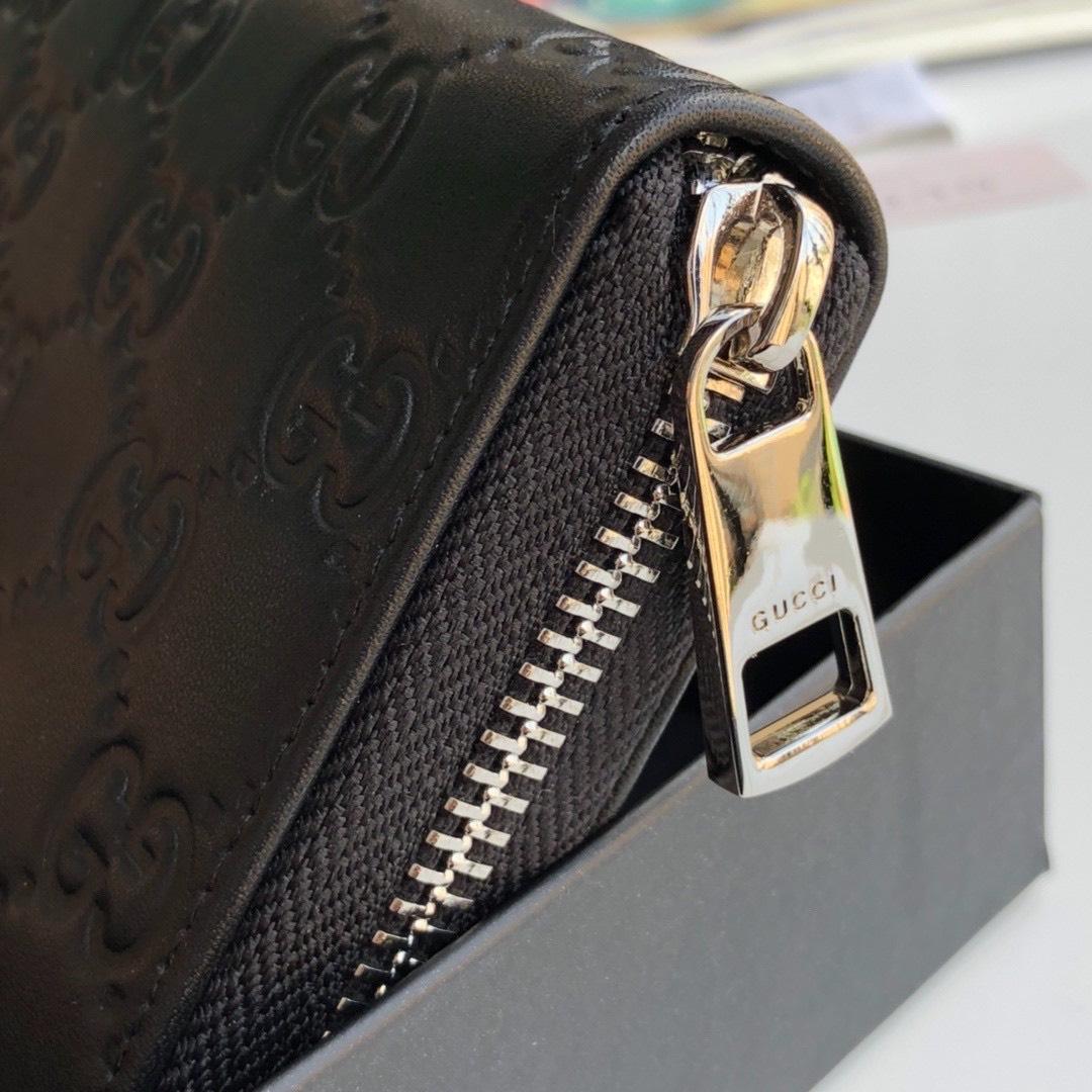 Ví nam Gucci siêu cấp khóa kéo họa tiết dập logo màu đen VNG91