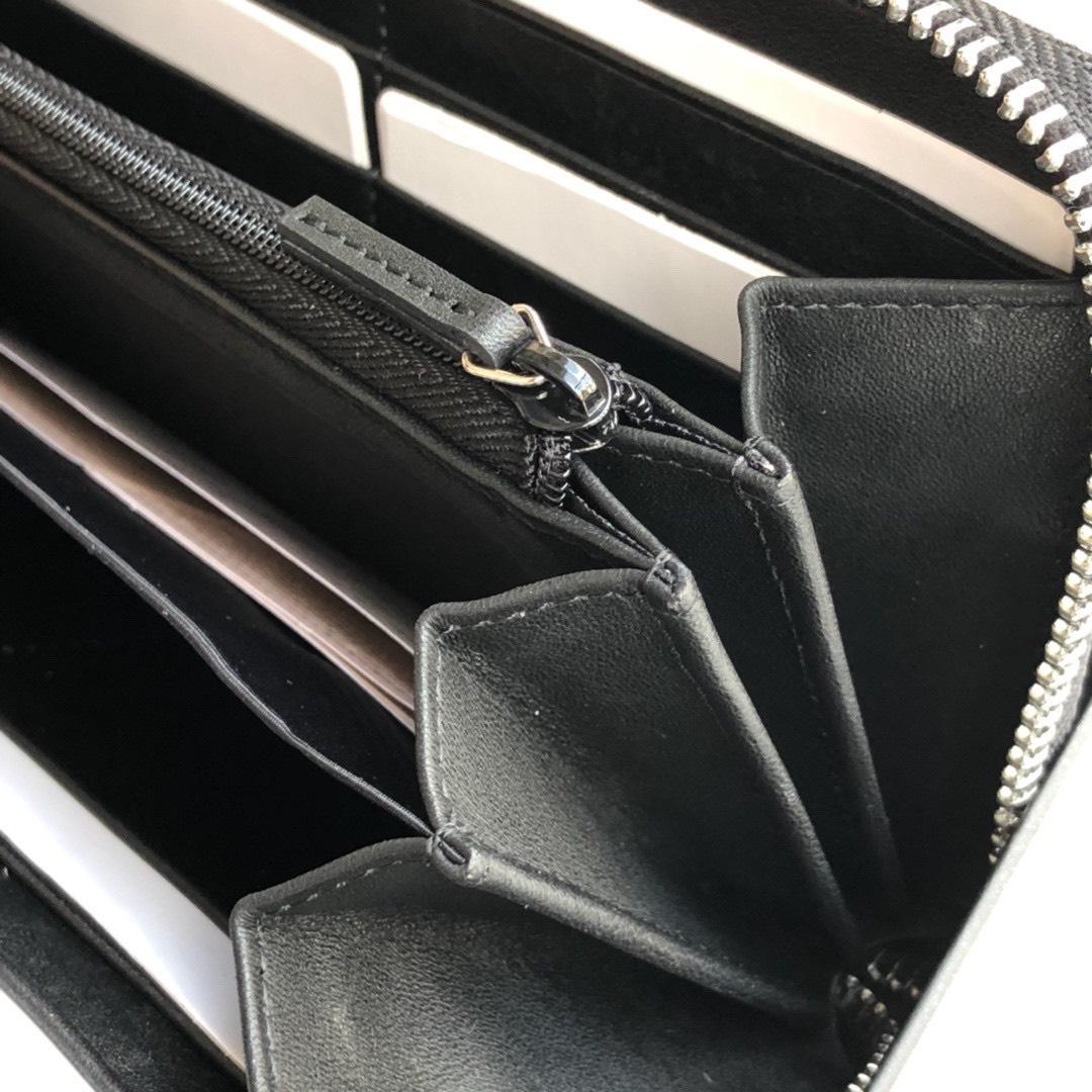 Ví nam Gucci siêu cấp khóa kéo họa tiết dập logo màu đen VNG91