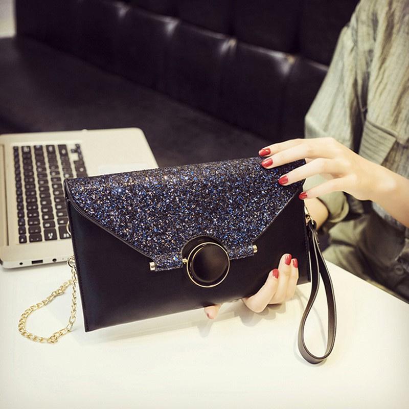 Ví dự tiệc cầm tay bản lớn đính nhiều hạt đá nổi trội