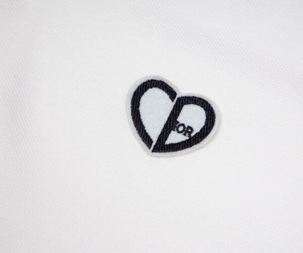 Áo Polo Dior White Heart hoạ tiết logo trái tim