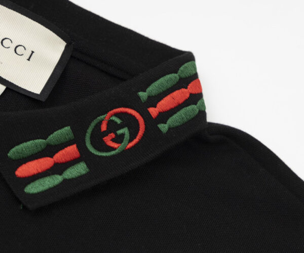 Áo Polo nam Gucci màu đen họa tiết cổ logo