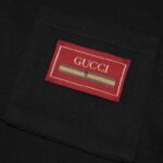 Áo Polo nam Gucci màu đen họa tiết tag đỏ