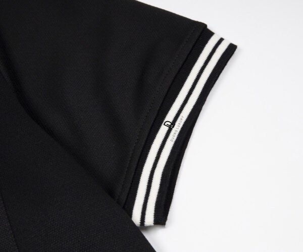 Áo Polo Gucci màu đen họa tiết cổ thêu logo tròn