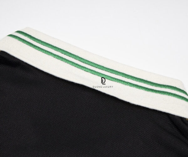 Áo Polo Gucci màu đen họa tiết cổ thêu logo tròn