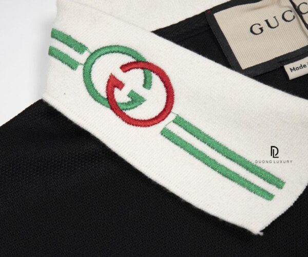 Áo Polo Gucci màu đen họa tiết cổ thêu logo tròn