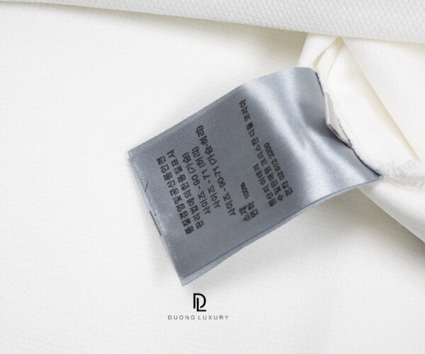 Áo Polo nam Dior màu trắng hoạ tiết ngực thêu chữ