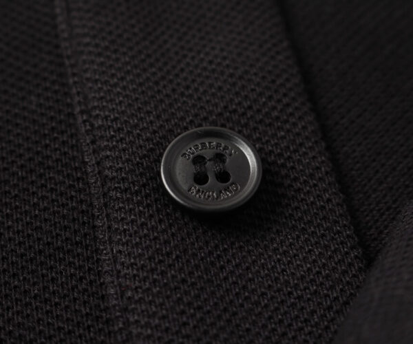 Áo Polo Burberry logo chữ TB màu đen Like Auth