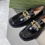 Giày lười Gucci da bóng màu đen logo GG vàng