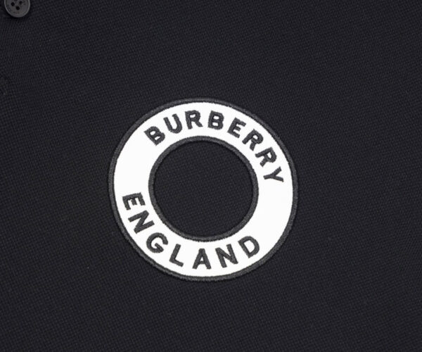 Áo Polo Burberry hoạ tiết logo tròn màu đen