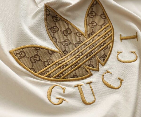 Áo Polo Gucci x Adidas màu bee họa tiết hoa vàng Like Auth